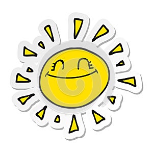 sticker of a happy cartoon sun