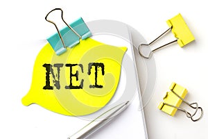 Sticker with NET text on notebooks on the white background