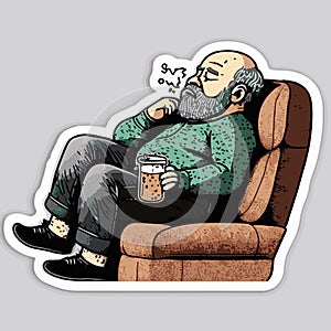 Sticker of an old man sleeping in a chair with a beer