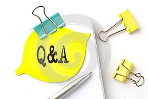 Sticker with Q A text on notebooks on the white background