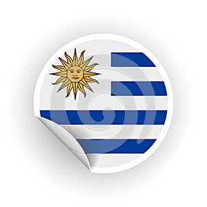 Sticker of Uruguay flag with peel off corner isolated on white background. Paper banner or circle curl label sticker with flip