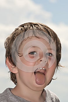 Sticking out his tounge