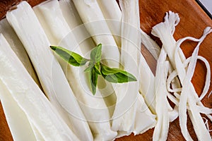 sticks made of buffalo mozzarella and red tomatoes