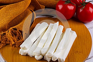 sticks made of buffalo mozzarella and red tomatoes