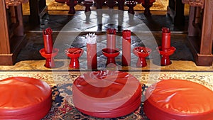 Sticks with predictions in oriental temple. Vases with traditional Seam-Si fortune teller sticks placed on floor in