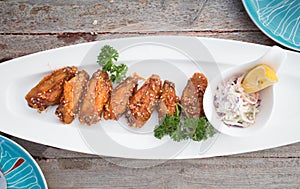 Sticky Chinese Chicken Wings with soy sauce and sesame