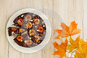 Sticky Chocolate Plum Cake with Autumn Decoration
