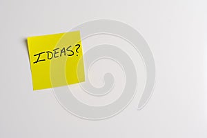 Sticky Note with Ideas on a White Background