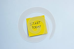 A sticky note that says 'start today'
