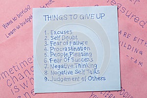 Sticky note with text things to give up