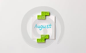 Sticky note on the white background. Business/education memo summer planning. Summer months motivation notes. August