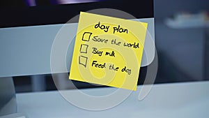 Sticky notes. Day plan. The inscription on the sticker on the monitor.