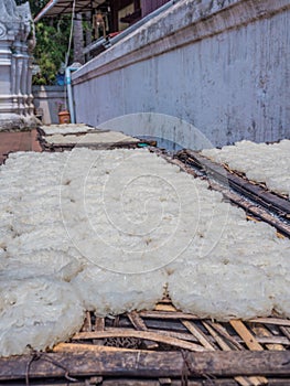 Sticky rice drying in the sun. Luang Phabang, Laos, Asia