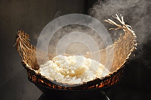 Sticky rice in wicker steamer photo