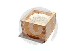 Sticky rices in a square wooden measuring box