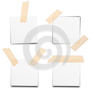 Sticky tape on note paper isolated