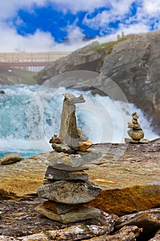 Stigfossen waterfall and stones stack - Norway