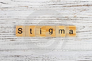 STIGMA word made with wooden blocks concept photo