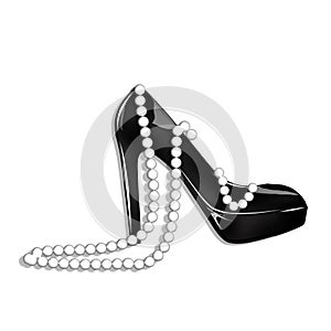 Stiletto shoe and pearl necklace photo