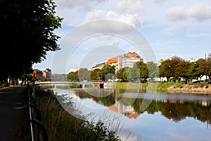 A still canal in MalmÃ¶, Sweden, on an early summer morning