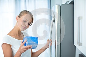 Is this still fine? Pretty, young woman in her kitchen