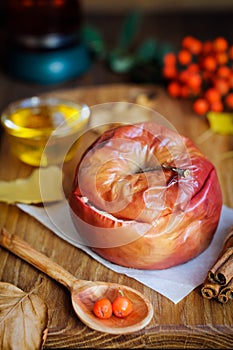 Still life of apple baked with honey