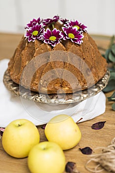 Still life with an apple sponge cakes