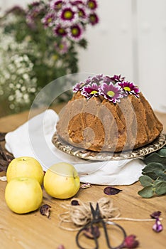 Still life with an apple sponge cakes