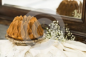 Still life with an apple sponge cakes