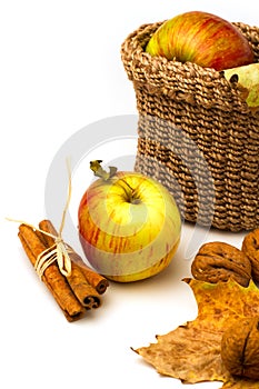 Still life with apples and autumn leaves