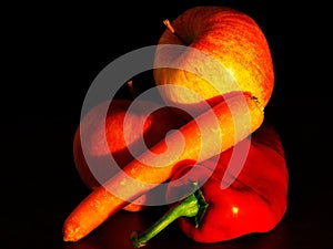 Still life with apples, carrots and peppers