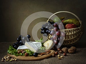 Still life with basket of beautiful orchids on the table