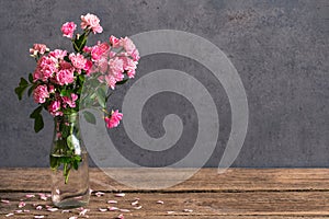 Still life with a beautiful bouquet of pink roses flowers. holiday or wedding background