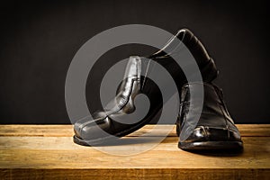 Still life with black man's shoes