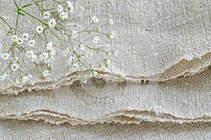 Still life with bouquet flowers on linen tablecloths