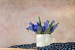 Still life bouquet spring flowers blue