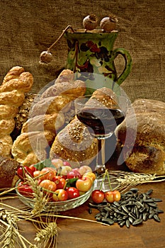 Still life with bread, cherrys, and wine