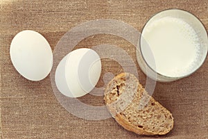 Still life with bread and egg, milk