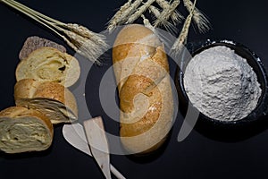 Still life of bread and wheat flour