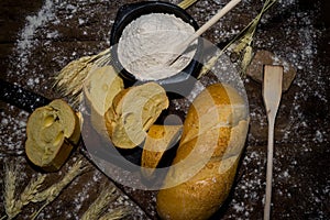 Still life of bread and wheat flour