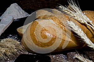 Still life of bread and wheat flour