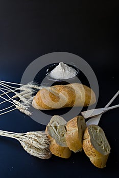 Still life of bread and wheat flour