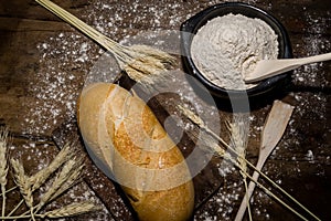 Still life of bread and wheat flour