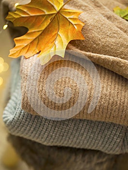 Still life of cashmere and woolen cozy sweaters , autumn season soft sweaters
