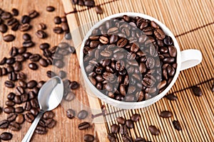 Still-life with a cup of coffee beans