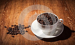 Still-life with a cup of coffee beans