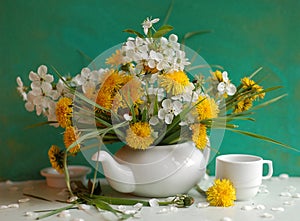 Still life with dandelions and inflorescence of ch