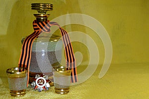 Still life with a decanter, glasses of wine, the order of the `Patriotic war` and St. George`s ribbon