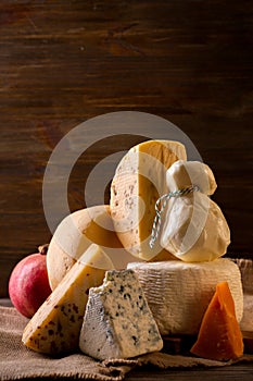 Assorted cheeses and pomegranates