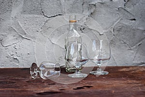 Still Life with differently shaped glass bottles